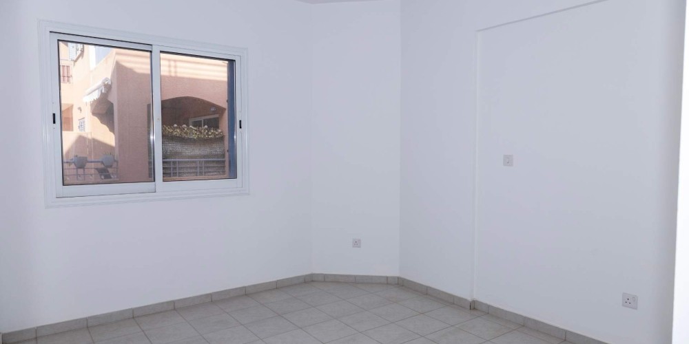 Apartments in a resort-style complex with a communal pool in Peyia, Paphos — photo 12