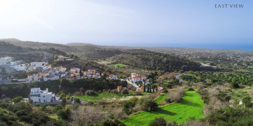 Hillside plot with panoramic sea views next to the golf course in Tsada, Paphos — photo 1