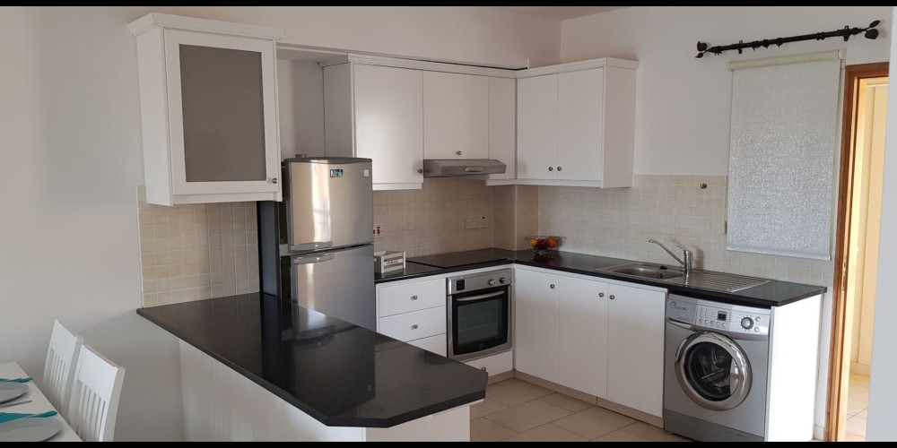 A resale 3 bedroom apartment with a communal pool in the tourist area of Paphos — photo 2